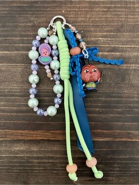 Disney Alice in wonderland walrus and baby oyster beaded keychain